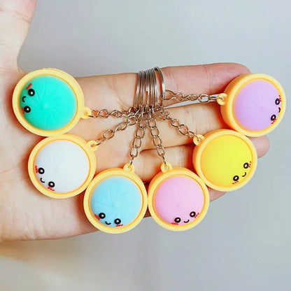 🔥LAST DAY 49% OFF - 🥟Cute Dumpling Pressable Fidget Keychain-touch sensing light