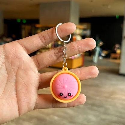 🔥LAST DAY 49% OFF - 🥟Cute Dumpling Pressable Fidget Keychain-touch sensing light